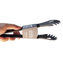 Load image into Gallery viewer, A pair of heat resistant serving and cooking tongs with black handles and a metallic body, possibly made of plastic or nylon.