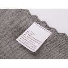 Load image into Gallery viewer, Gray textured fabric with a label on a white background
