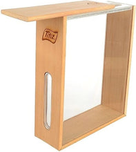 Load image into Gallery viewer, A Tiftz brand wooden frame with a light natural wood finish, featuring a clear glass panel, a vertical handle cutout, and a top shelf on a white background.