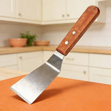 Load image into Gallery viewer, Multi-Purpose Stainless Steel Kitchen Spatula - Ice Removal Shovel, Cleaning Scraper, Degrease Tool - Angled on a kitchen counter.