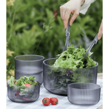 تحميل الصورة في عارض المعرض، Large Salad and Fruit Bowl Set with stylish ribbed texture, featuring bowls and utensils outdoors, ideal for salads and gatherings.