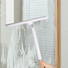 Load image into Gallery viewer, 360° rotating squeegee with ergonomic handle cleaning window with soap lather for streak-free shine.