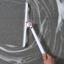 Load image into Gallery viewer, 360-degree rotating squeegee cleaning a tiled surface, showcasing its efficient design and rubber blade for streak-free shine.