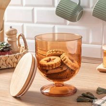 Load image into Gallery viewer, A transparent acrylic food storage container with a wooden lid, filled with various cookies and placed on a table.
