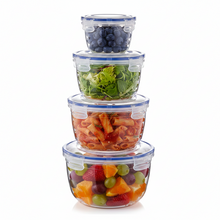 تحميل الصورة في عارض المعرض، A set of four clear round food storage containers with blue lids, stacked in order of size.