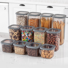Load image into Gallery viewer, Food Storage Containers Set with Silicone Lid Square ( 1750 ml ) filled with various dry foods and snacks.