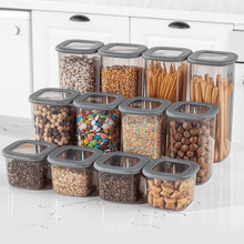 Load image into Gallery viewer, Food Storage Containers Set with Silicone Lid Square ( 1750 ml ) filled with various dry foods and snacks.