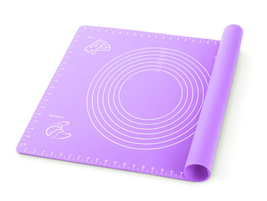 Purple silicone baking mat with measuring guidelines and rolled corner, ideal for pastry preparation.