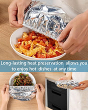 Load image into Gallery viewer, Person using reusable aluminum foil insulation cover over a bowl of food for long-lasting heat preservation.
