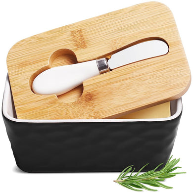 Porcelain butter dish with bamboo lid, silicone sealing ring, and spreader, stylish design for butter storage.