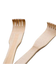 Load image into Gallery viewer, Beige knee-high socks with a ribbed texture on a black background
