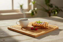 Load image into Gallery viewer, Bamboo cutting board with geometric pattern on a gray background, featuring the brand 'Bandeja Bambu'.
