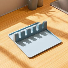 Load image into Gallery viewer, Blue dish drying rack on a wooden countertop
