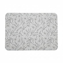 Load image into Gallery viewer, A rectangular mouse pad with rounded corners, featuring a light beige background with a dark gray floral and leaf pattern, resting on a wooden desk.
