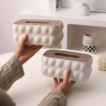 Load image into Gallery viewer, Two textured white tissue boxes being held by a person in a minimalistic setting.
