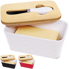Load image into Gallery viewer, Porcelain butter dish with bamboo lid and spreader, holding butter sticks, available in white and black.
