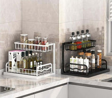 Load image into Gallery viewer, Two kitchen storage racks on a countertop with various items including jars and bottles.
