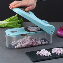 Load image into Gallery viewer, 3 Blades Vegetables Slicer | Professional Manual Chopper cutting onion into small pieces on a kitchen countertop.
