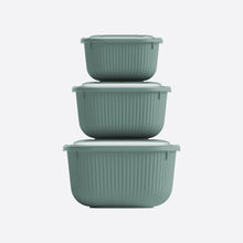 تحميل الصورة في عارض المعرض، Set of three green ribbed storage containers stacked on a white background
