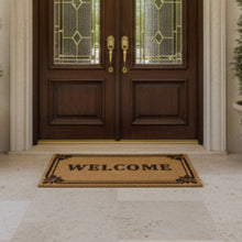 تحميل الصورة في عارض المعرض، Brown doormat with 'WELCOME' text in front of a wooden door with glass panels.
