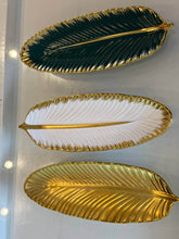 تحميل الصورة في عارض المعرض، Three leaf-shaped trays in green, white, and gold on a light gray background
