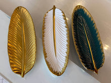 تحميل الصورة في عارض المعرض، Three leaf-shaped decorative items with gold edges on a white surface
