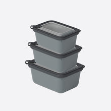 تحميل الصورة في عارض المعرض، Set of three gray food storage containers with black lids on a white background
