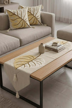 Load image into Gallery viewer, Linen handmade runner and cushions set displayed on a coffee table, featuring decorative cushion covers and an elegant table runner.
