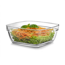 Load image into Gallery viewer, Clear glass bowl with shredded carrots and spinach on a white background
