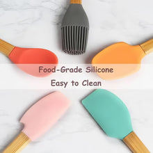 تحميل الصورة في عارض المعرض، Colorful silicone spatulas with wooden handles on a light background, labeled &#39;Food-Grade Silicone Easy to Clean&#39;.
