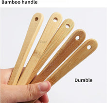 تحميل الصورة في عارض المعرض، Hand holding four bamboo sticks with text &#39;Bamboo handle&#39; and &#39;Durable&#39; on a white background

