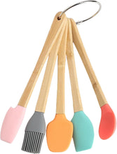 تحميل الصورة في عارض المعرض، Set of five colorful silicone spatulas with wooden handles on a white background
