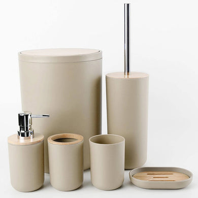 Beige bathroom accessory set including a trash can, cups, soap dispenser, and soap dish on a white background.