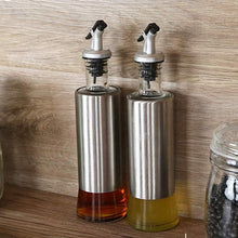 تحميل الصورة في عارض المعرض، Stainless steel oil and vinegar dispenser set with glass bottles, ideal for cooking and healthy dining.
