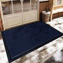 Load image into Gallery viewer, Navy blue doormat on a tiled floor outside a building entrance.
