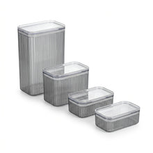 Load image into Gallery viewer, Four ribbed rectangular storage bins with lids, shown in a size-ladder arrangement from tallest on the left to shortest on the right, on a plain white background.
