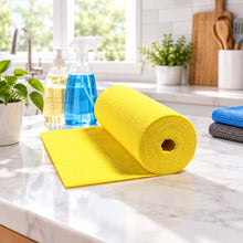 Load image into Gallery viewer, A roll of bright yellow material, partially unrolled to show its flat rectangular sheet, set against a plain white background.
