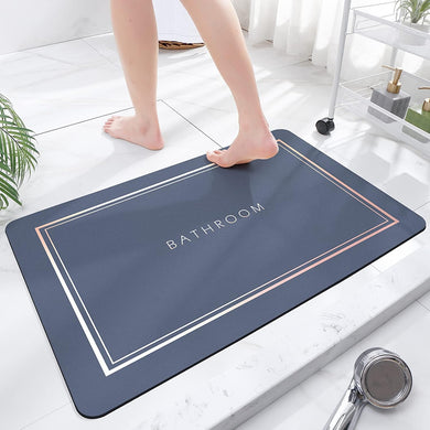 Bathroom mat with 'Bathroom' text on a white floor