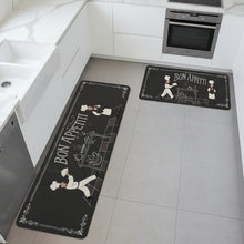 تحميل الصورة في عارض المعرض، Two 'Bon Appétit' themed kitchen mats on a tiled floor.
