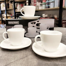 Load image into Gallery viewer, White coffee cups and saucers on a table with a &#39;Danny Home&#39; branded box in the background.
