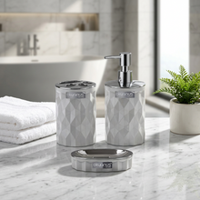 Load image into Gallery viewer, A three-piece bathroom accessory set including a liquid soap dispenser, a toothbrush and paste cup, and a dry soap dispenser, in black color with a geometric diamond pattern and silver frame.

