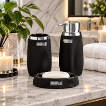 Load image into Gallery viewer, Black bathroom set with soap dispenser, toothbrush holder, and soap dish on a white background
