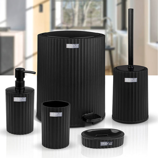 Black bathroom accessory set including a bottle, holder, and brush on a white surface.