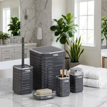 تحميل الصورة في عارض المعرض، Set of gray bathroom accessories including a trash can, brush holder, and soap dish on a reflective surface.
