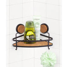 Load image into Gallery viewer, Corner shower caddy with bottles and a loofah on a tiled shower wall.

