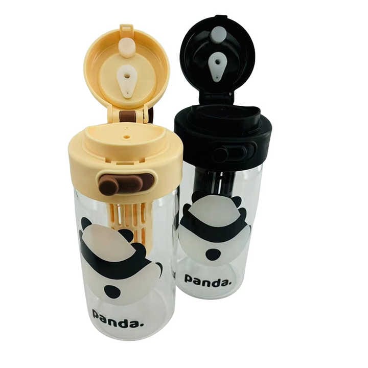 Two glass water bottles with flip-top lids, one beige and one black, both with a cartoon design of a character on the front.