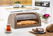 Load image into Gallery viewer, Wicker bread box with bread inside on a kitchen counter with tea and brownies.
