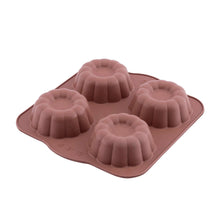 Load image into Gallery viewer, Silicone mold with cupcake shapes on a white background
