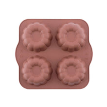 Load image into Gallery viewer, Silicone mold with flower-shaped cavities on a white background
