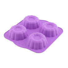 Load image into Gallery viewer, Purple silicone mold with four cavity shapes on a white background
